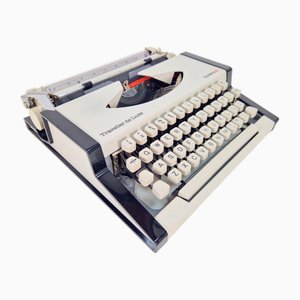Máquina de escribir Olympia Traveller De Luxe vintage con estuche, años 70