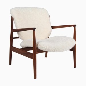 Lounge Chair in Sheepskin & Walnut by Finn Juhl, France