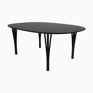 Mesa de comedor Ellipse de roble negro atribuida a Piet Hein & Bruno Mathsson para Fritz Hansen, Dinamarca, años 60