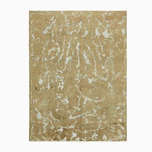 Grand tapis beige surteint