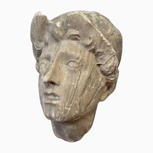 Escultura antigua de escayola de rostro femenino, de principios del siglo XX