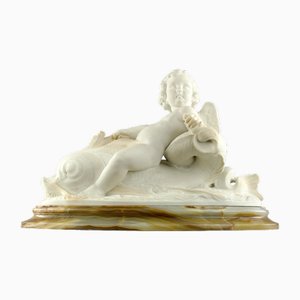 Hippolyte Ferrat, Sculpture d'un Angelot chevauchant un dauphin, 19ème Siècle, Marbre