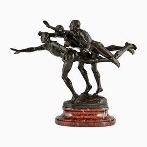 Alfred Boucher, Au But Escultura de 3 corredores desnudos, 1890, Bronce sobre base de mármol