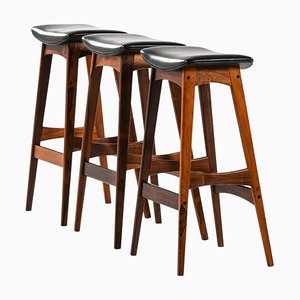 Bar Stools in Rosewood and Black Leather by Johannes Andersen, 1961, Set of 3