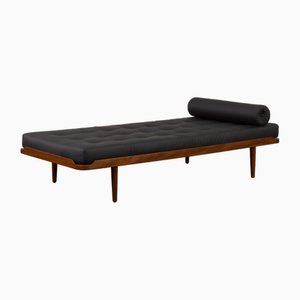 Dormeuse Mid-Century in teak in pelle nera di Ejvind Johansson, Danimarca, anni '60