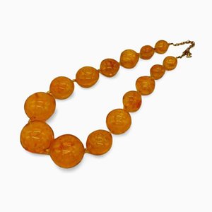 Vintage Orange Resin Beaded Charm Necklace with CC Mark and Camellia Motifs from Chanel