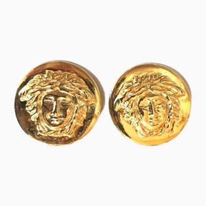 Vintage Round Gold Tone Medusa Face Motif Earrings from Gianni Versace, Set of 2