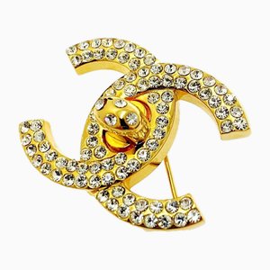 Spilla CcCPin vintage dorata con cristalli di Chanel