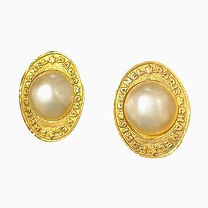 Vintage Golden Earrings with Oval Shape Faux Pearl and Engraved Logo from Chanel, Set of 2