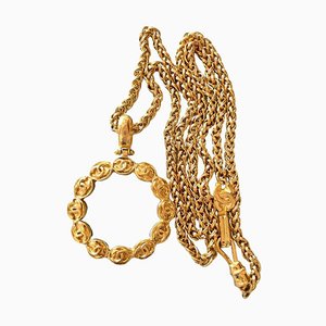Collar vintage de cadena larga con parte superior colgante de lupa redonda de vidrio y motivos CC de Chanel