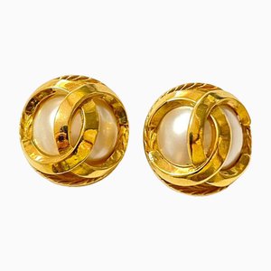 Vintage Gold Tone Round Earrings with Faux Pearl and 3d CC Motif from Chanel, Set of 2