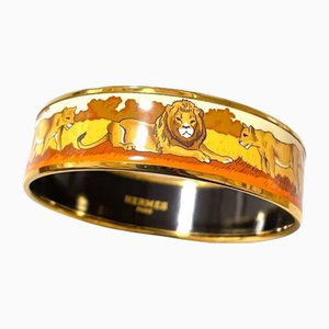 Brazalete vintage dorado esmaltado con diseño de pareja de leones de Hermes