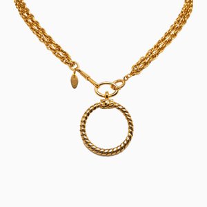 Collana con ciondolo a forma di lente d'ingrandimento con doppia catena placcata in oro di Chanel