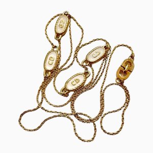 Collar delgado vintage de cadena dorada con dijes de Cd ovalados en oro y blanco de Christian Dior