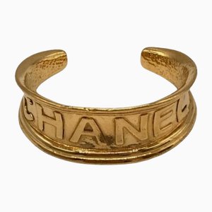 Vintage Golden Bangle with Embossed Logo from Chanel