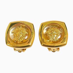 Vintage Clear and Gold Tone Medusa Face Motif Earrings from Gianni Versace, Set of 2