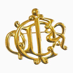 Goldfarbene Vintage Logo Brosche von Christian Dior