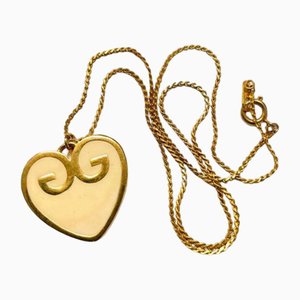 Collana skinny vintage dorata con parte superiore del cuore e logo bianco di Givenchy