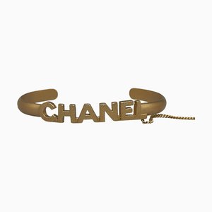 Bracciale rigido con logo e catena di Chanel