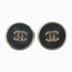 Pendientes Cocomark de metal / plástico bronce de cañón / negro de Chanel. Juego de 2