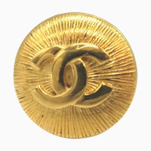 Broche Cocomark de metal dorado de Chanel