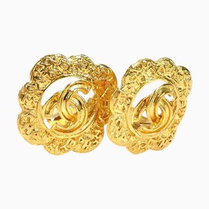 Pendientes vintage de metal dorado de Chanel. Juego de 2