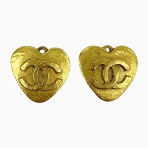 Aretes Coco Mark Heart Gp 95p dorados para mujer de Chanel. Juego de 2