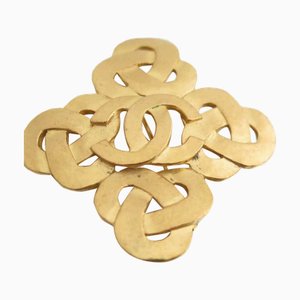 Broche CHANEL aquí marca metal dorado damas