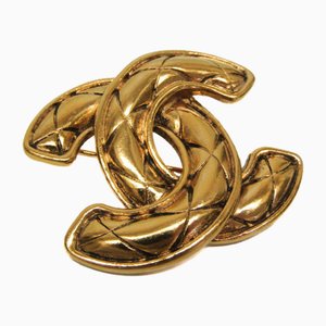 Goldbrosche aus Metall von Chanel