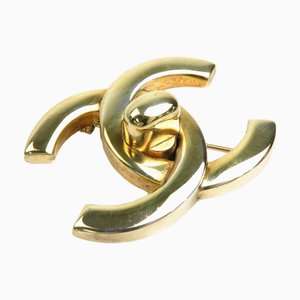 Coco Mark Turnlock Metal Gold Brooch from Chanel