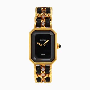 Orologio da donna vintage con quadrante nero e quarzo dorato di Chanel