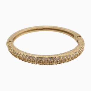 Bracciale rigido Dior con strass in oro di Christian Dior