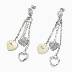 Orecchini con triplo cuore oscillante in argento di Christian Dior, set di 2