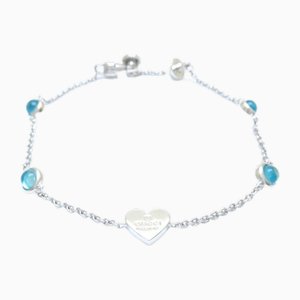 Bracciale con targhetta a forma di cuore in topazio blu e argento di Gucci