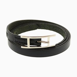 Brazalete HERMES Api 3 de cuero negro con grabado E