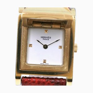 HERMES Medor Reloj de mujer con esfera blanca y pantalla analógica de cuarzo 〇W bañado en oro