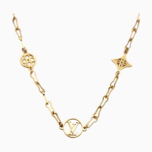 Gargantilla con forma de flor con monograma LV de metal en oro de Collier Forever Young de Louis Vuitton