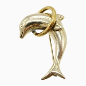 Broche con forma de delfín de plata y oro de Tiffany & Co.