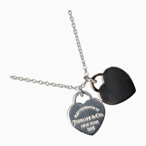 Collar con etiqueta en forma de corazón doble con punta de retorno en plata de Tiffany & Co.
