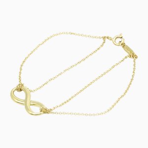 Brazalete Infinity de doble cadena en oro amarillo de Tiffany & Co.