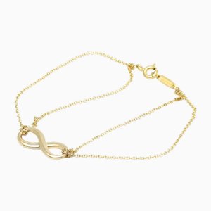 Brazalete Infinity de doble cadena en oro amarillo de Tiffany & Co.