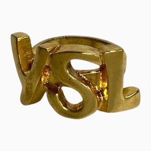 Anello in metallo dorato di Yves Saint Laurent
