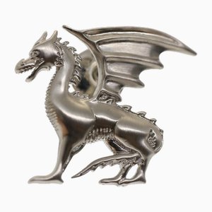 Broche de dragón de metal plateado de Hermes