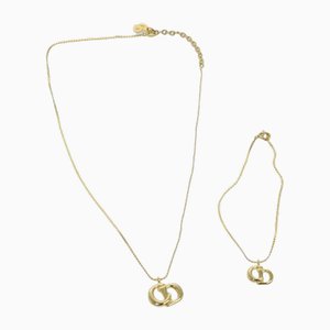 Brazalete y collar en oro de Christian Dior. Juego de 2