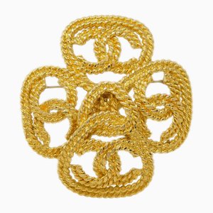 Spilla a forma di trifoglio in oro di Chanel