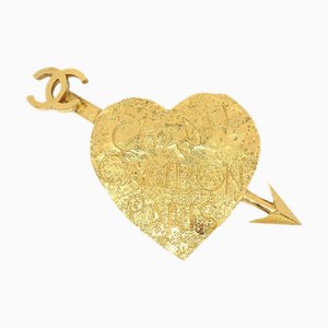 CHANEL 1993 Broche de flecha con forma de corazón de graffiti en oro 52870