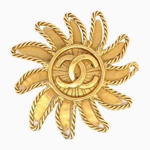Goldene Sonnenbrosche von Chanel