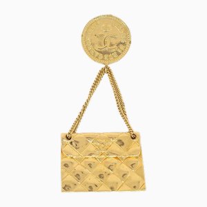 Broche para bolso en dorado de Chanel
