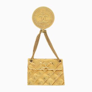 Taschenbrosche in Gold von Chanel