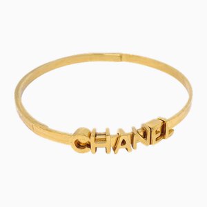 Bracciale rigido dorato di Chanel